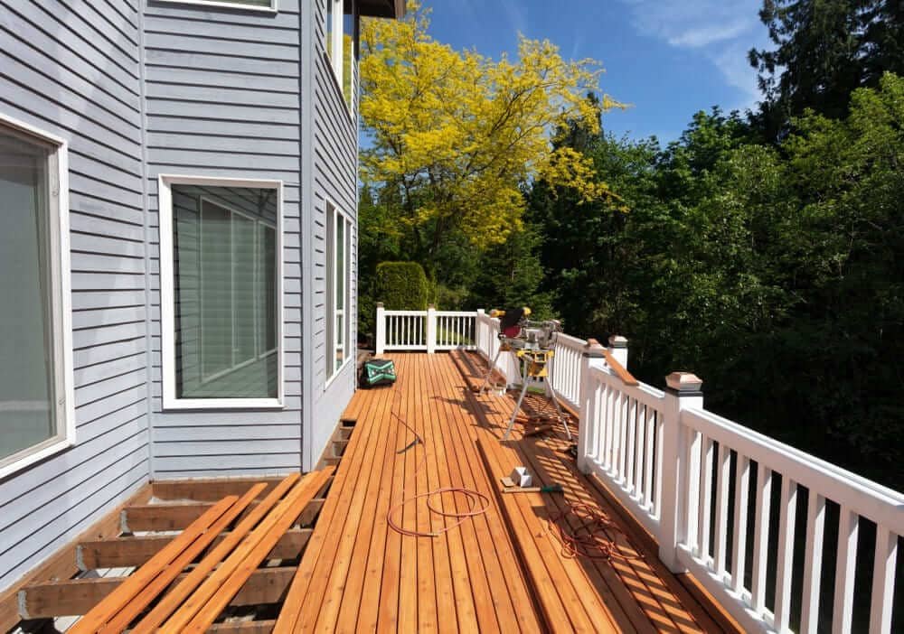 The wooden deck boards are being fixed.