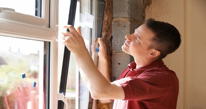 how to remove moisture from between window panes